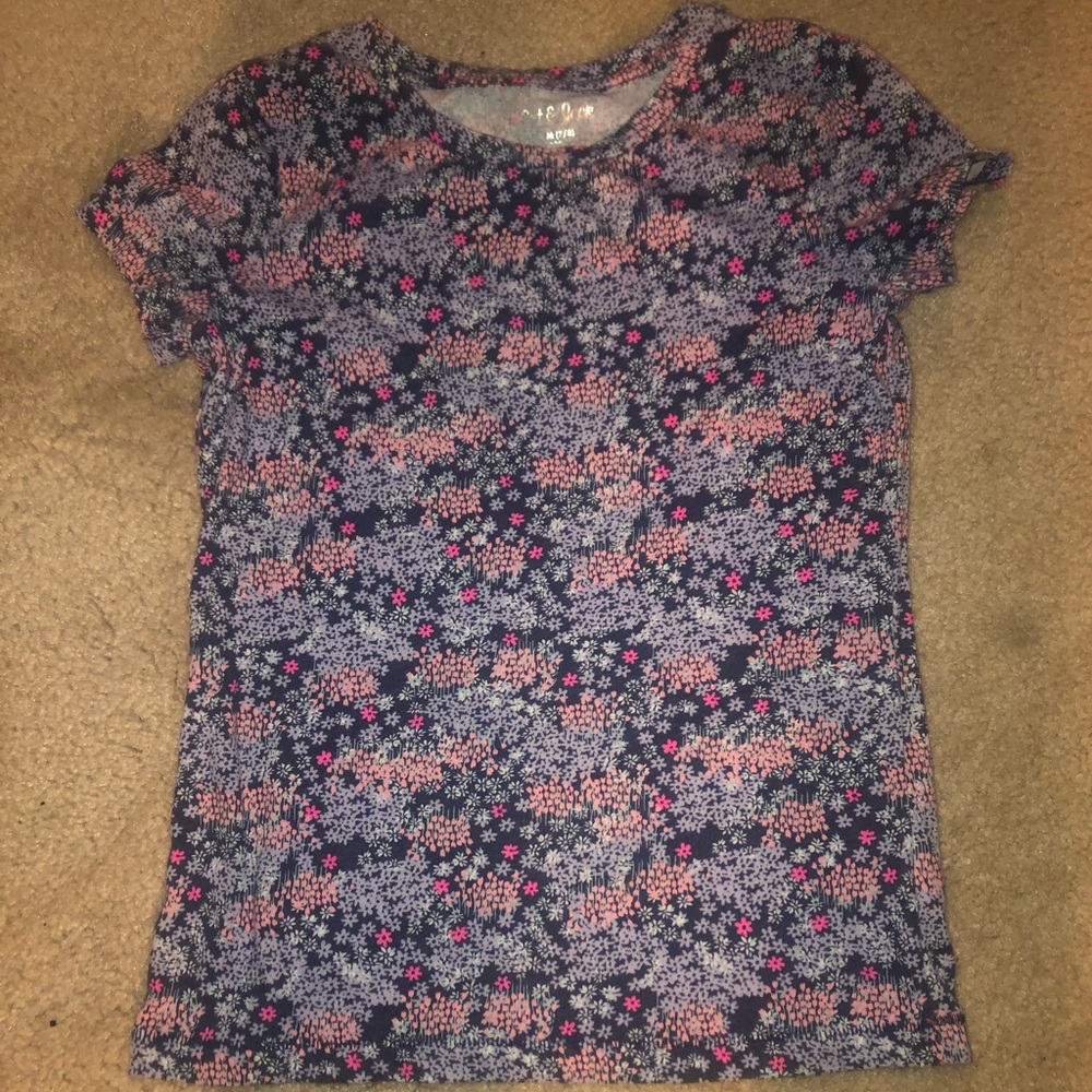 Navy blue T-shirt with flowers.